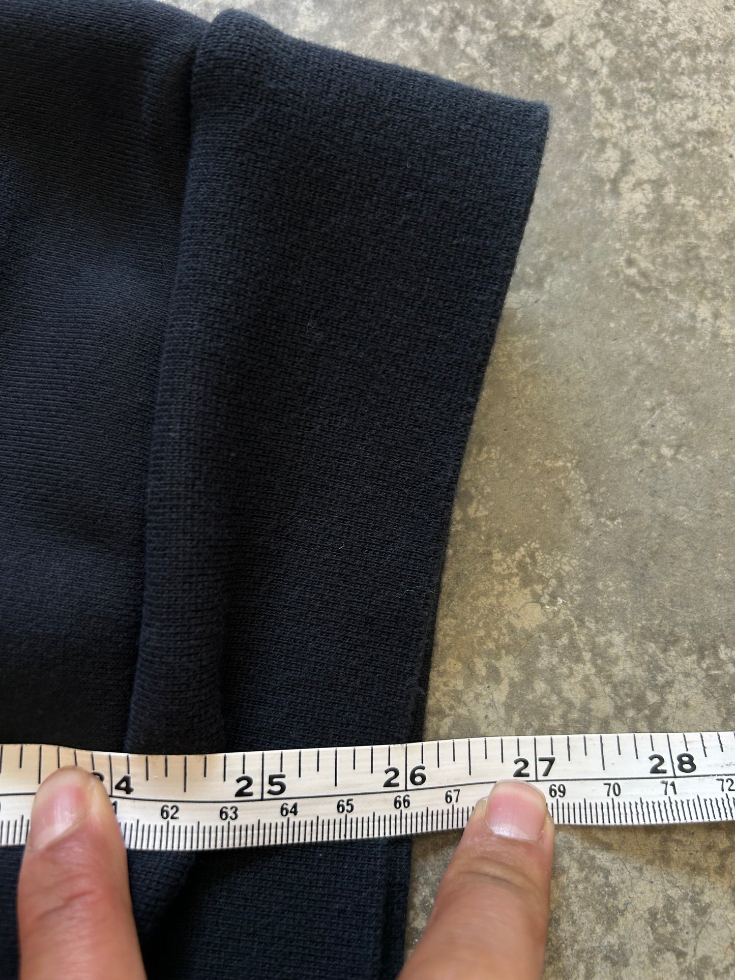black Jordan Jumpman Men's Fleece Crew Sweatshirt, which features side pockets and a prominent white "JUMPMAN" graphic with the Nike swoosh Medium