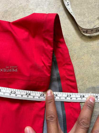 Macpac Lightweight Prophet Rain Jacket, a technical alpine hardshell designed for extreme conditions above the snowline Alpine Series Medium Red