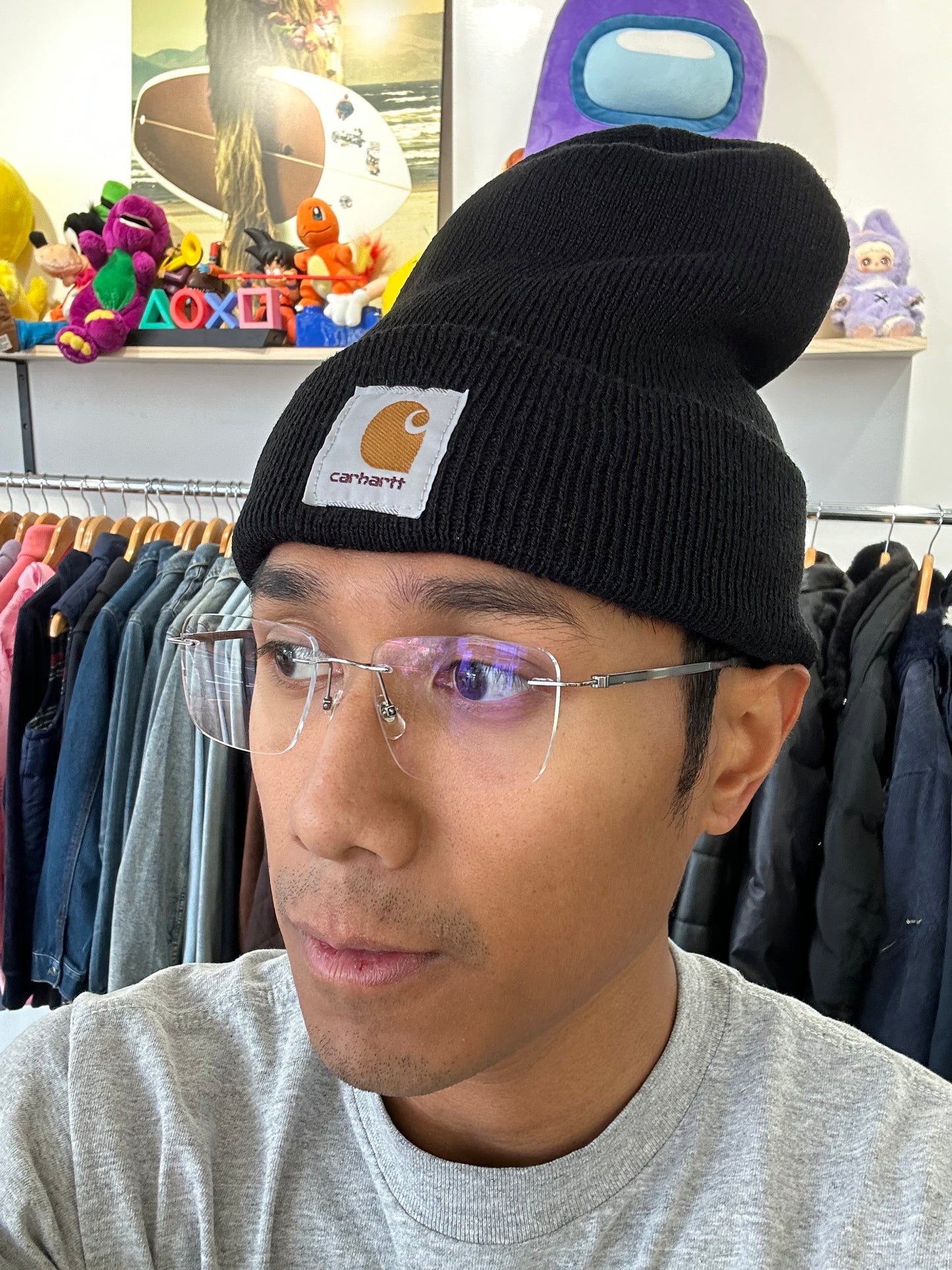Carhartt WIP Acrylic Watch Beanie in black, featuring a folded cuff and a woven square logo patch