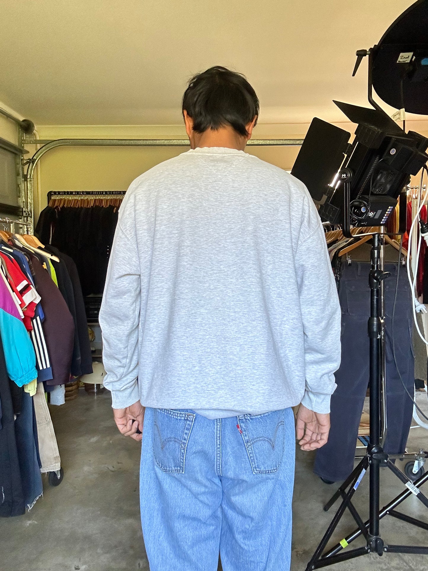 vintage-style Tommy Jeans crewneck sweatshirt features a prominent vertical logo patch on the chest Large
