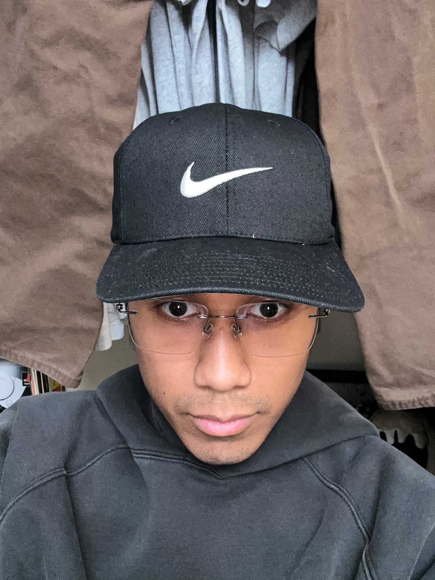 Vintage black Nike baseball cap featuring a white embroidered Swoosh Cotton