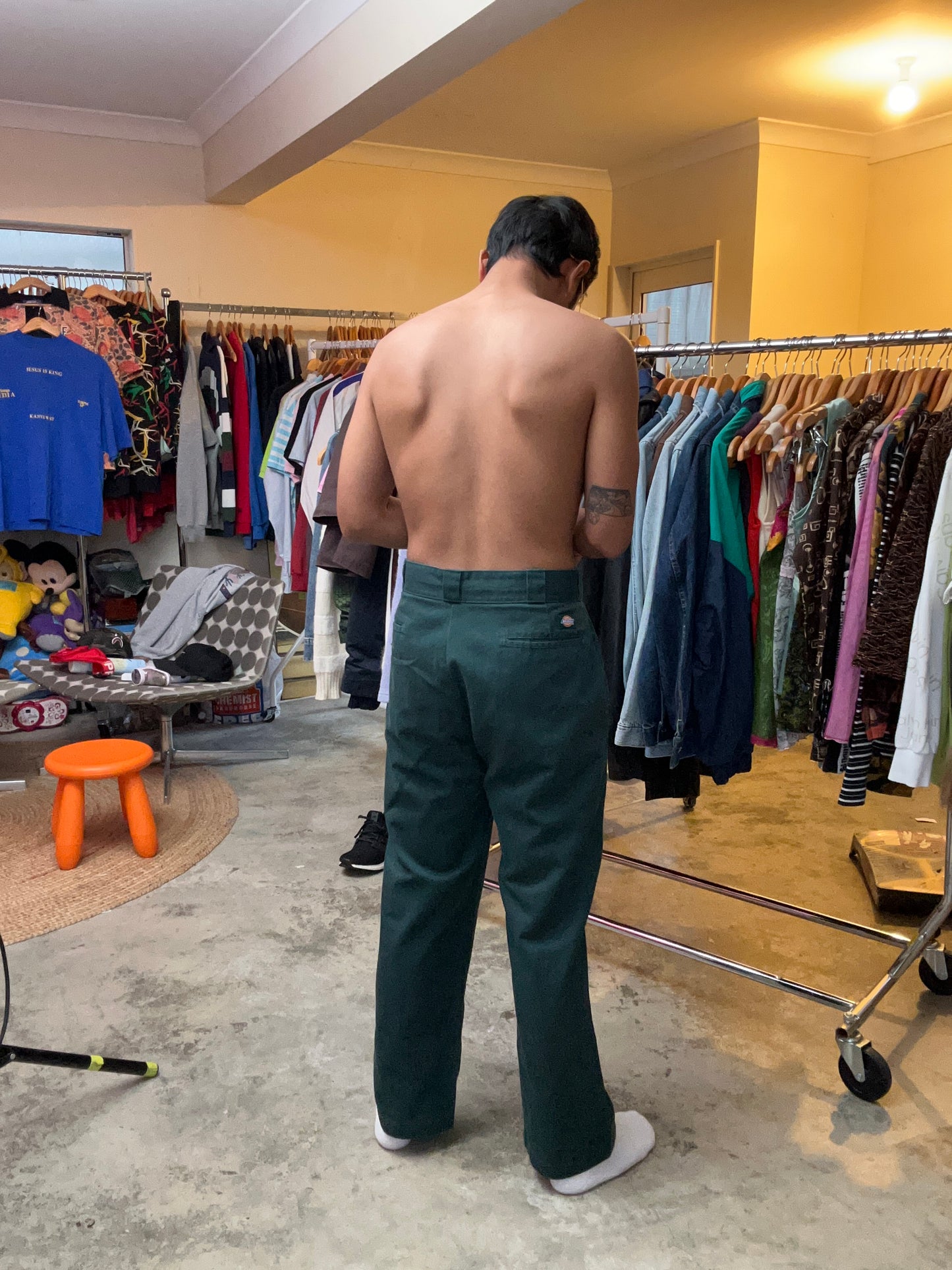 Vintage green Dickies 874 Original Fit Work Pants, recognized by their iconic tunnel belt loops and straight-leg cut 34