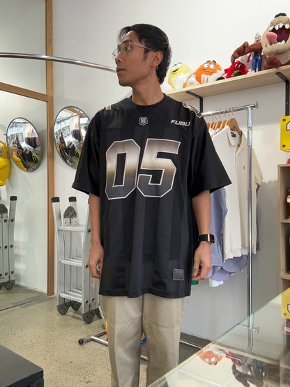 Vintage black FUBU Game Day jersey features gradient "05" numbering and embroidered branding Medium