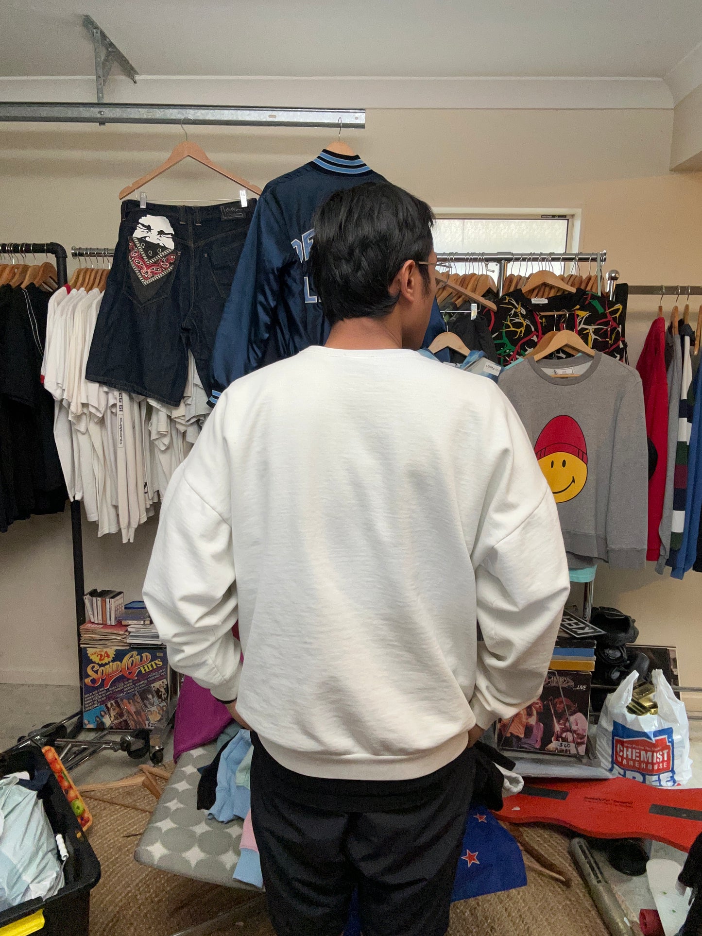 vintage white crewneck sweatshirt features a large graphic of Ed the hyena from The Lion King with the text "MAN ARE YOU UGLEEEE Large