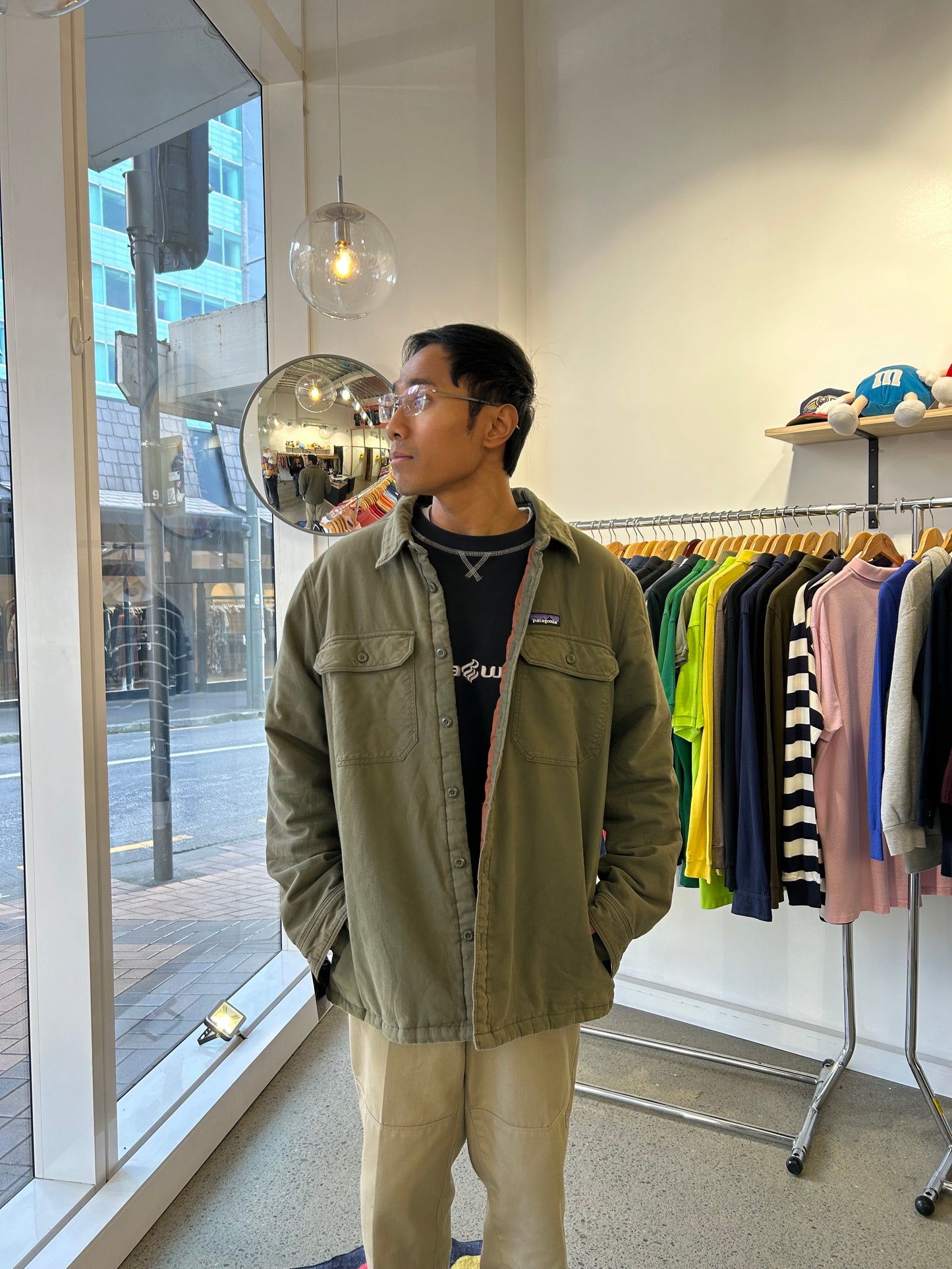 Patagonia Men's Insulated Fjord Flannel Shirt in a green color, featuring button-down closures and chest pockets Large