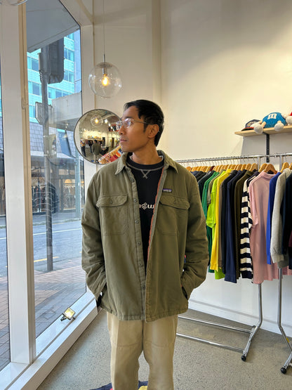 Patagonia Men's Insulated Fjord Flannel Shirt in a green color, featuring button-down closures and chest pockets Large