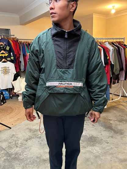 vintage Nautica Competition pullover jacket featuring a green nylon shell with a grey fleece lining and orange accents XL