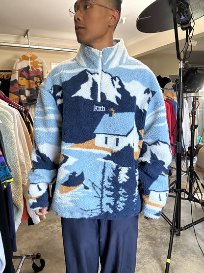Kith Lakeside Claremont Sherpa Quarter Zip in the Summit colorway, featuring a graphic lakeside scene and a branded quarter-zip closure XL Blue