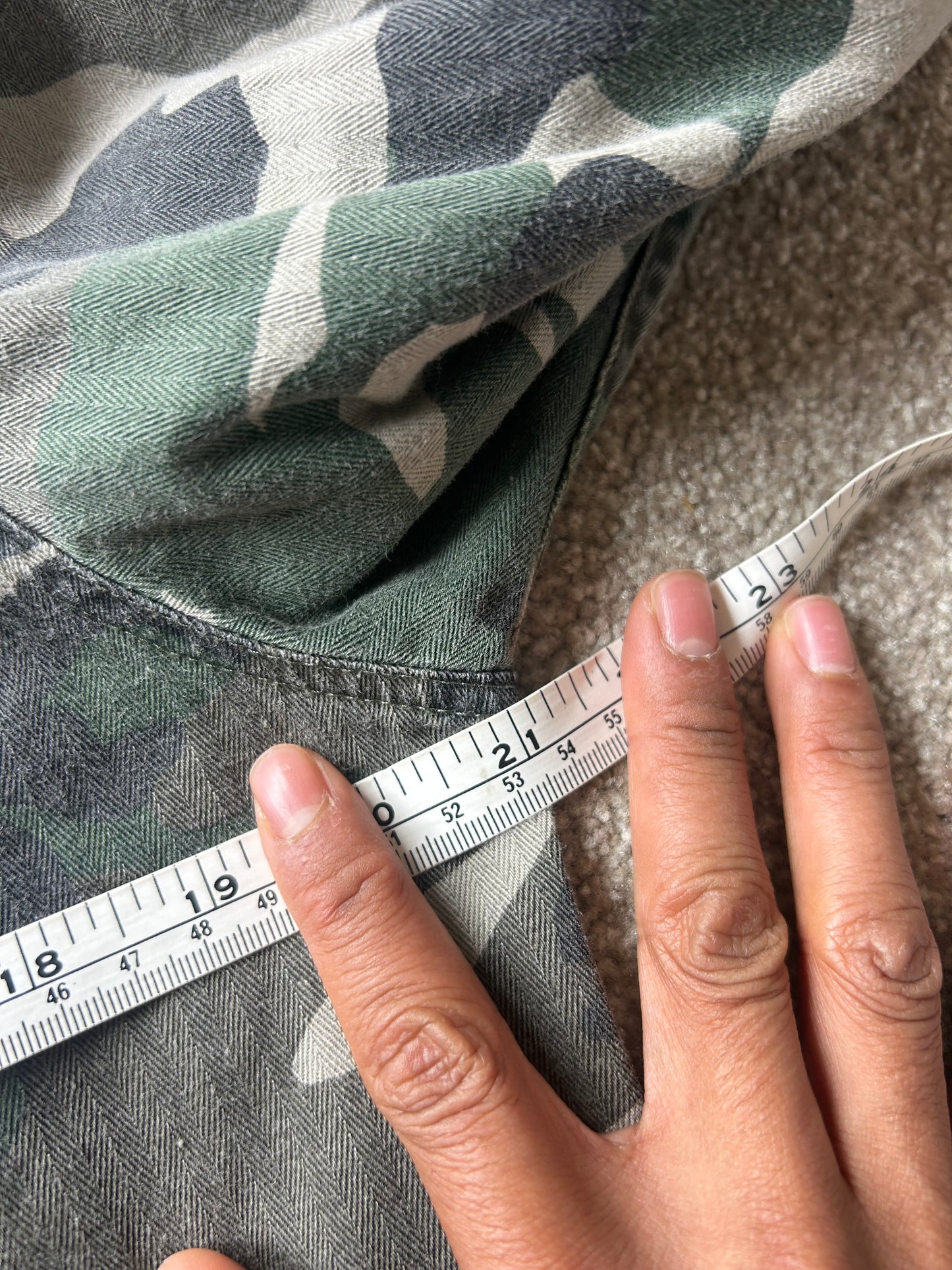 Stussy camouflage cargo shirt featuring a button-up front and a logo patch on the chest Medium