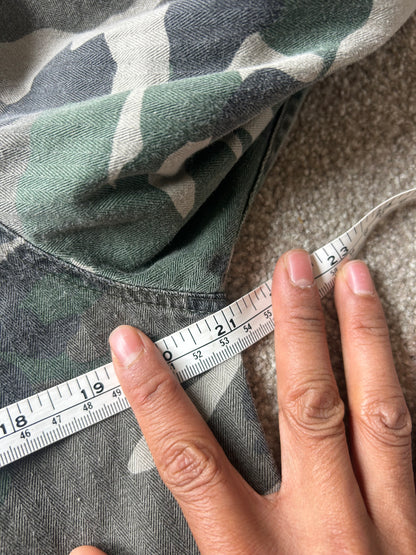 Stussy camouflage cargo shirt featuring a button-up front and a logo patch on the chest Medium