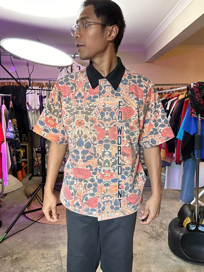 F*cking Awesome Warm Up Top featuring an all-over floral print. Medium Orange