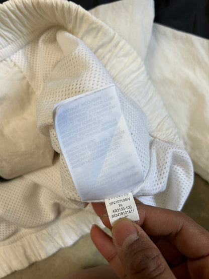 Nike Big Swoosh Woven Statement Jacket, often referred to as a windbreaker, which features a prominent large swoosh design XL White