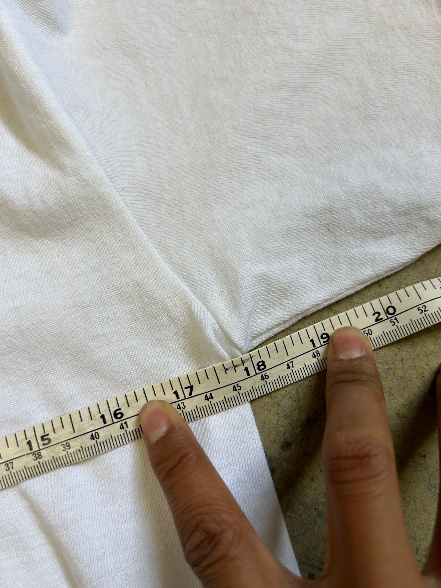 white cotton t-shirt featuring a "Wellington" graphic Small Anvill Blue Tag