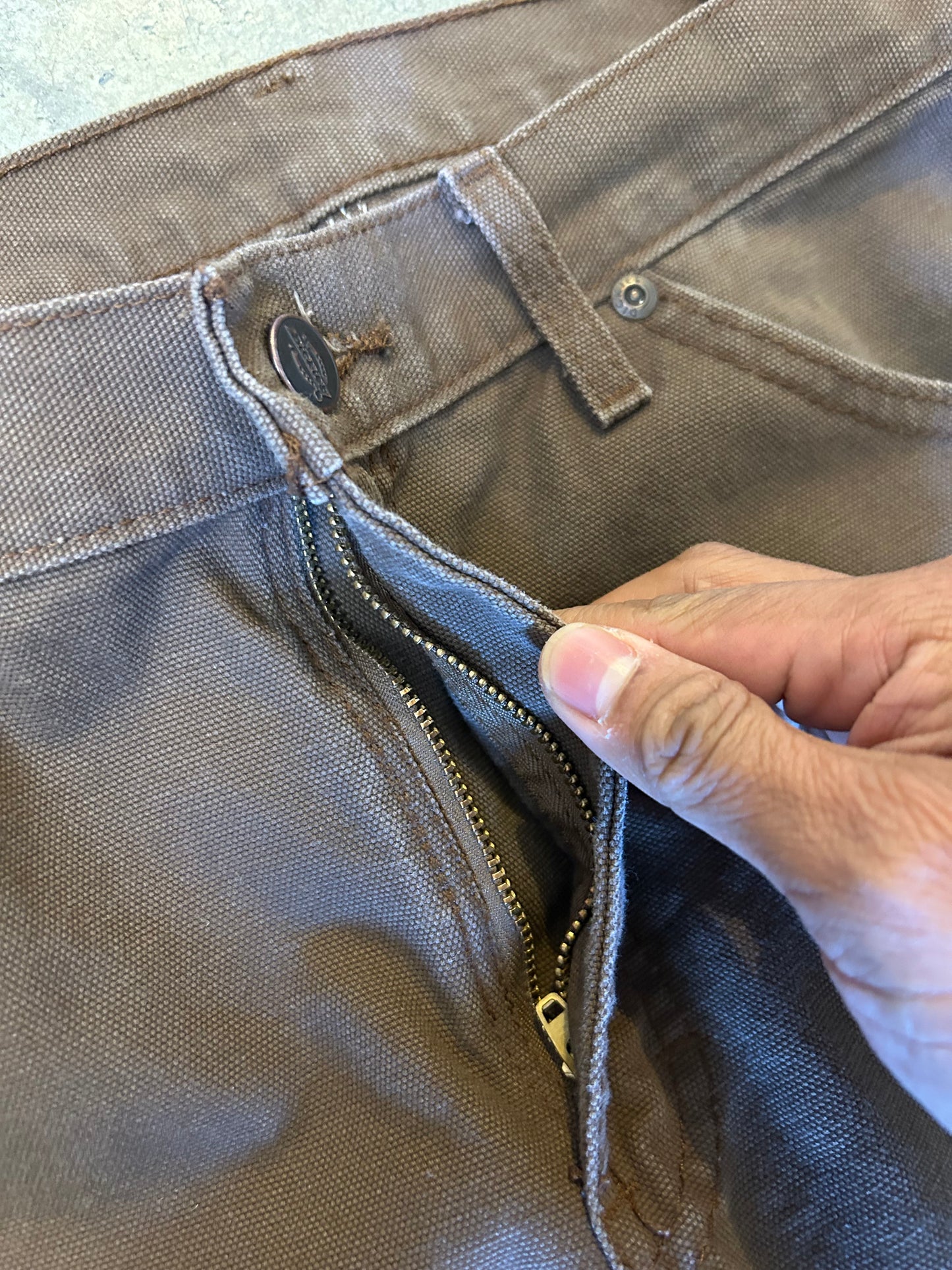 Vintage brown Dickies Relaxed Fit Duck Carpenter Jeans featuring a hammer loop and dual tool pockets