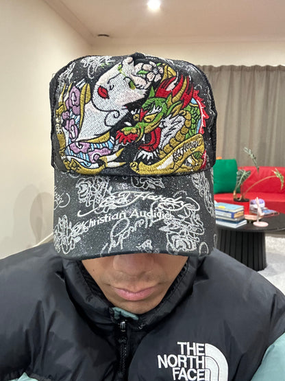 Vintage black Ed Hardy trucker cap features prominent embroidered dragon and geisha