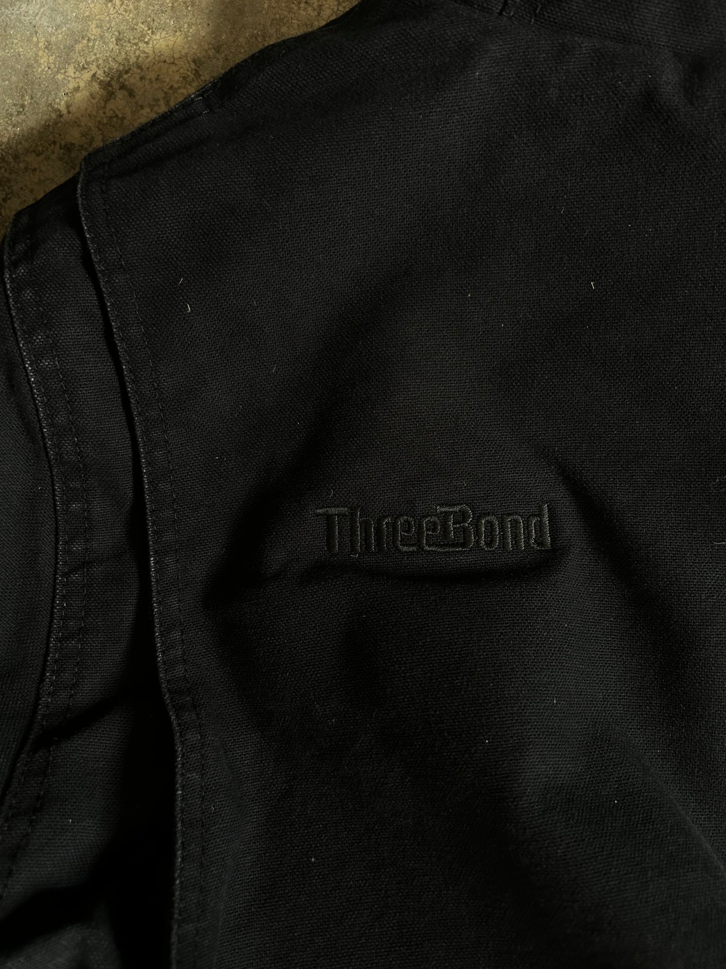 black hooded jacket from the Lands' End Workwear line, featuring a quilted lining Medium
