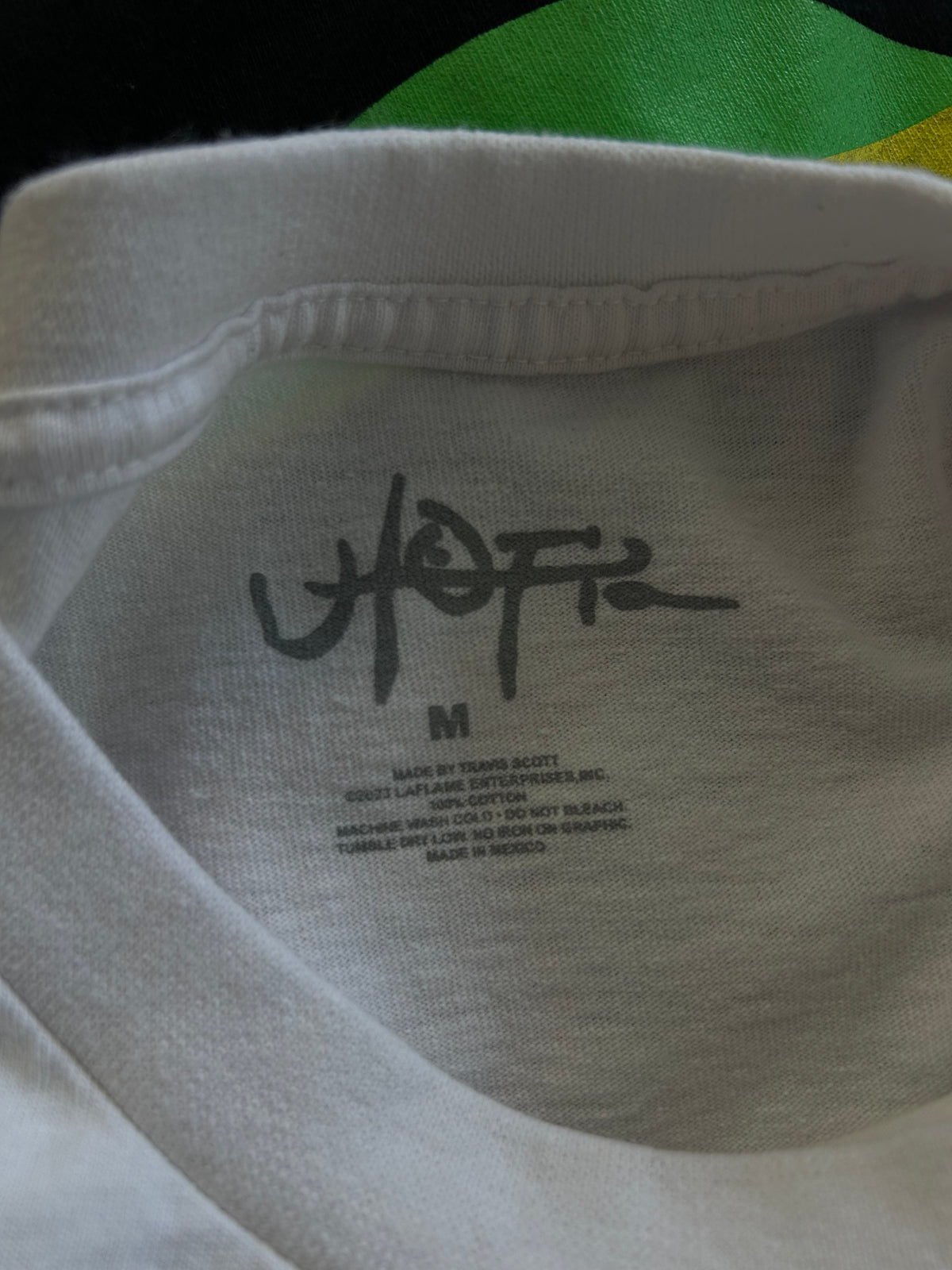 white Travis Scott Utopia B1 Tee featuring a colorful abstract graphic and the word "utopia" on the chest Medium