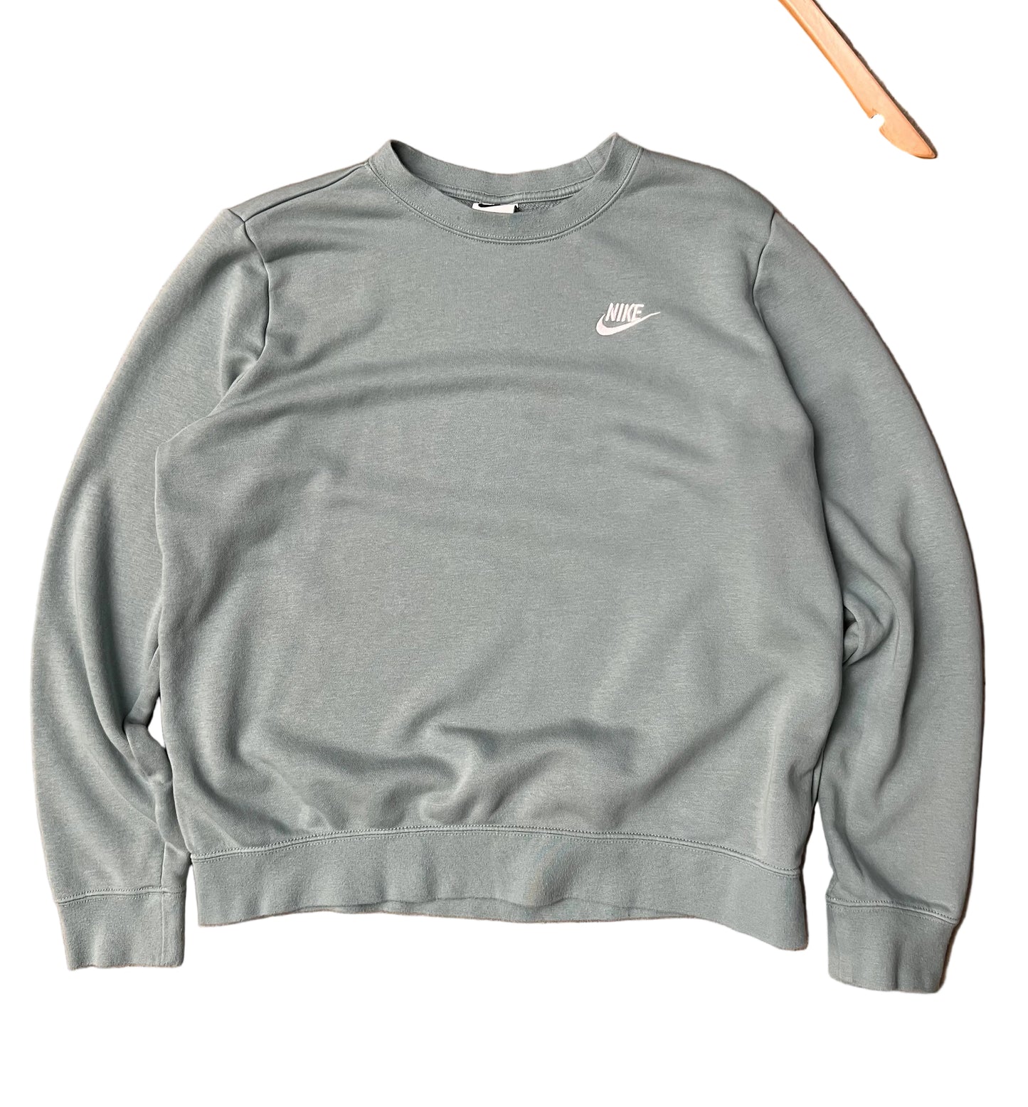 green Nike Men's Sportswear Club Fleece Crew features a classic embroidered logo on the chest Large