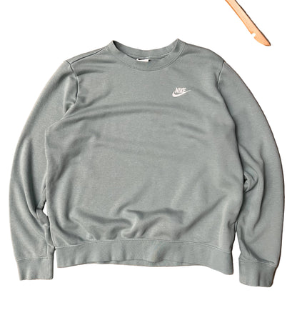 green Nike Men's Sportswear Club Fleece Crew features a classic embroidered logo on the chest Large