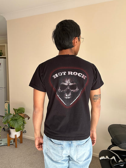 black graphic t-shirt featuring a skeleton playing an electric guitar Hot Rock Tee