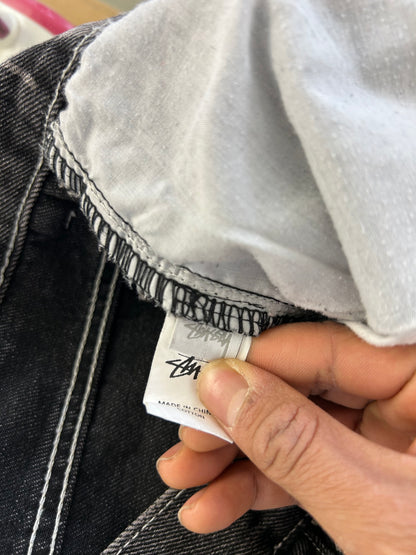 black Stüssy Stock 8 Big OL Jeans featuring an all-over washed graphic print of the brand's iconic 8-ball and stock logo 34