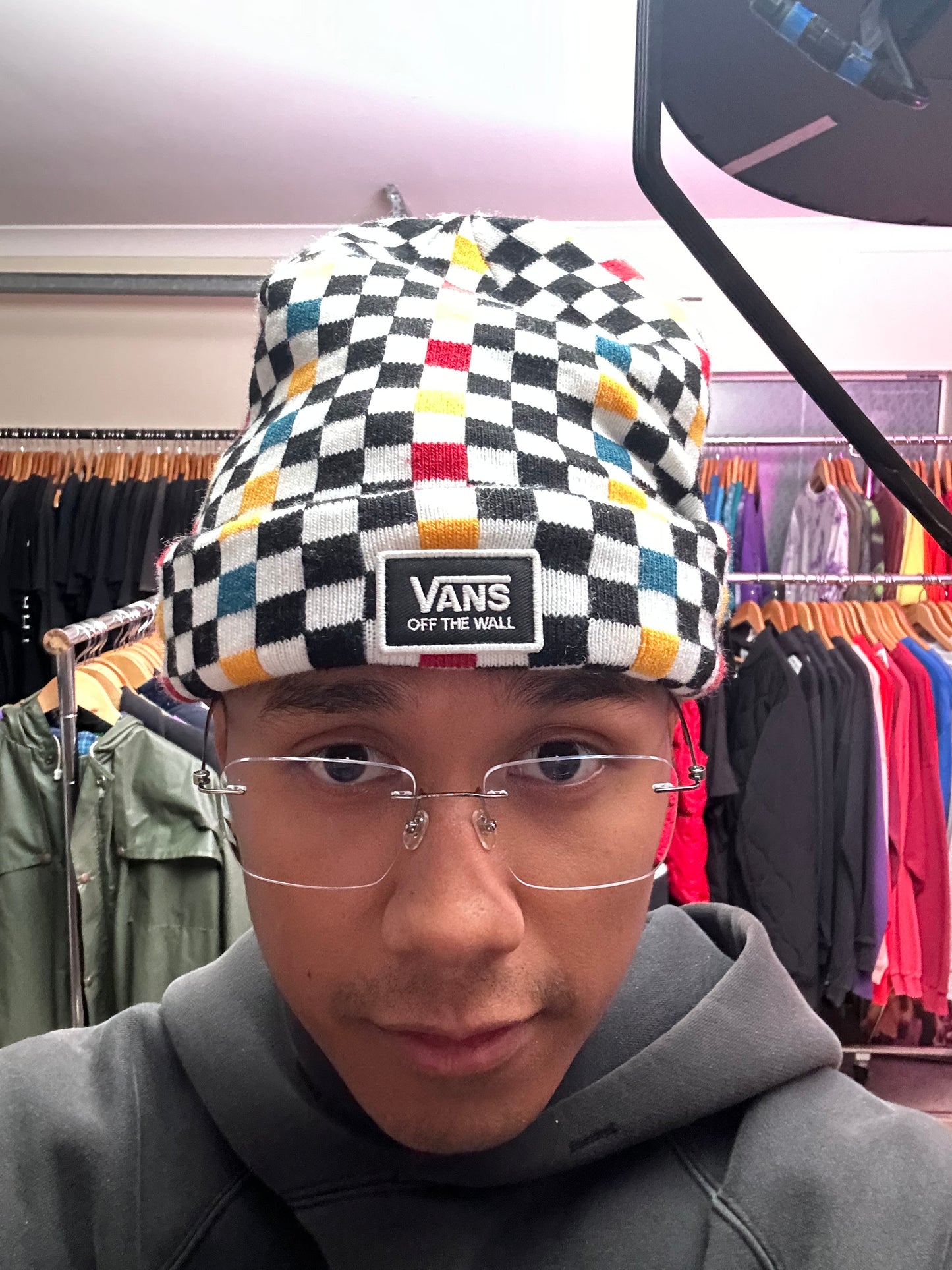 Vans Breakin Out Beanie features a multi-colored checkerboard pattern and a fold-over cuff with the iconic "Off The Wall" label