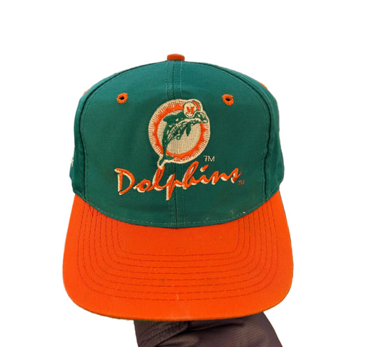 vintage Miami Dolphins snapback hat features a distinctive orange brim contrasting with a teal crown