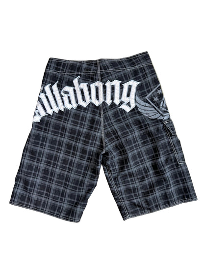 2000s Billabong black and grey plaid board shorts featuring a large embroidered logo on the back 32