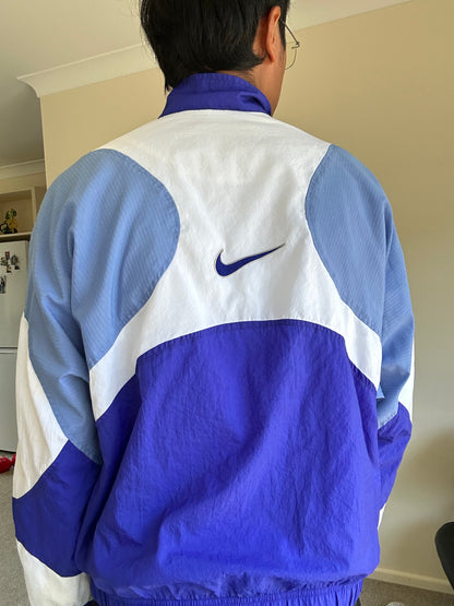 vintage Nike 90s woven windbreaker jacket in blue and white Medium