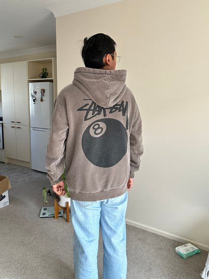 Stüssy 8 Ball Pigment Dyed Hoodie in a brown/taupe color, made from heavy cotton fleece