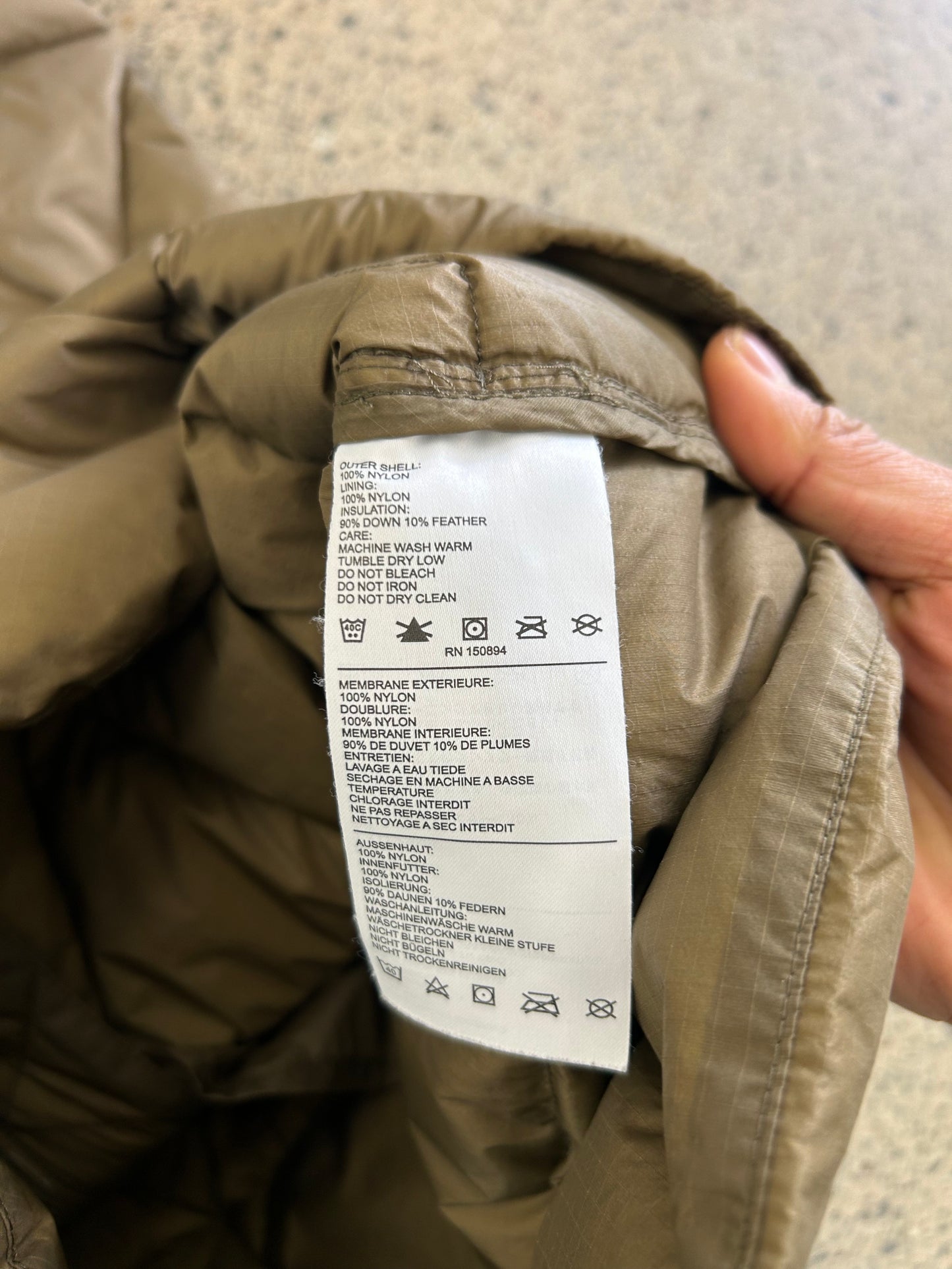 Holden Pyramid Down Vest in a brown olive color, featuring a unique triangular quilted pattern. Large