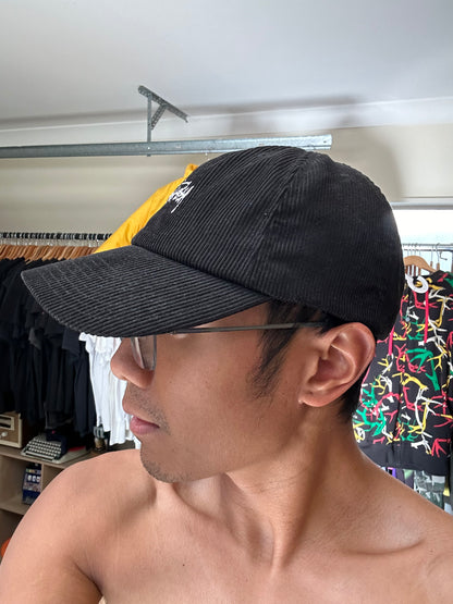 Stussy Graffiti Cord Low Pro Cap in black corduroy fabric Osfa