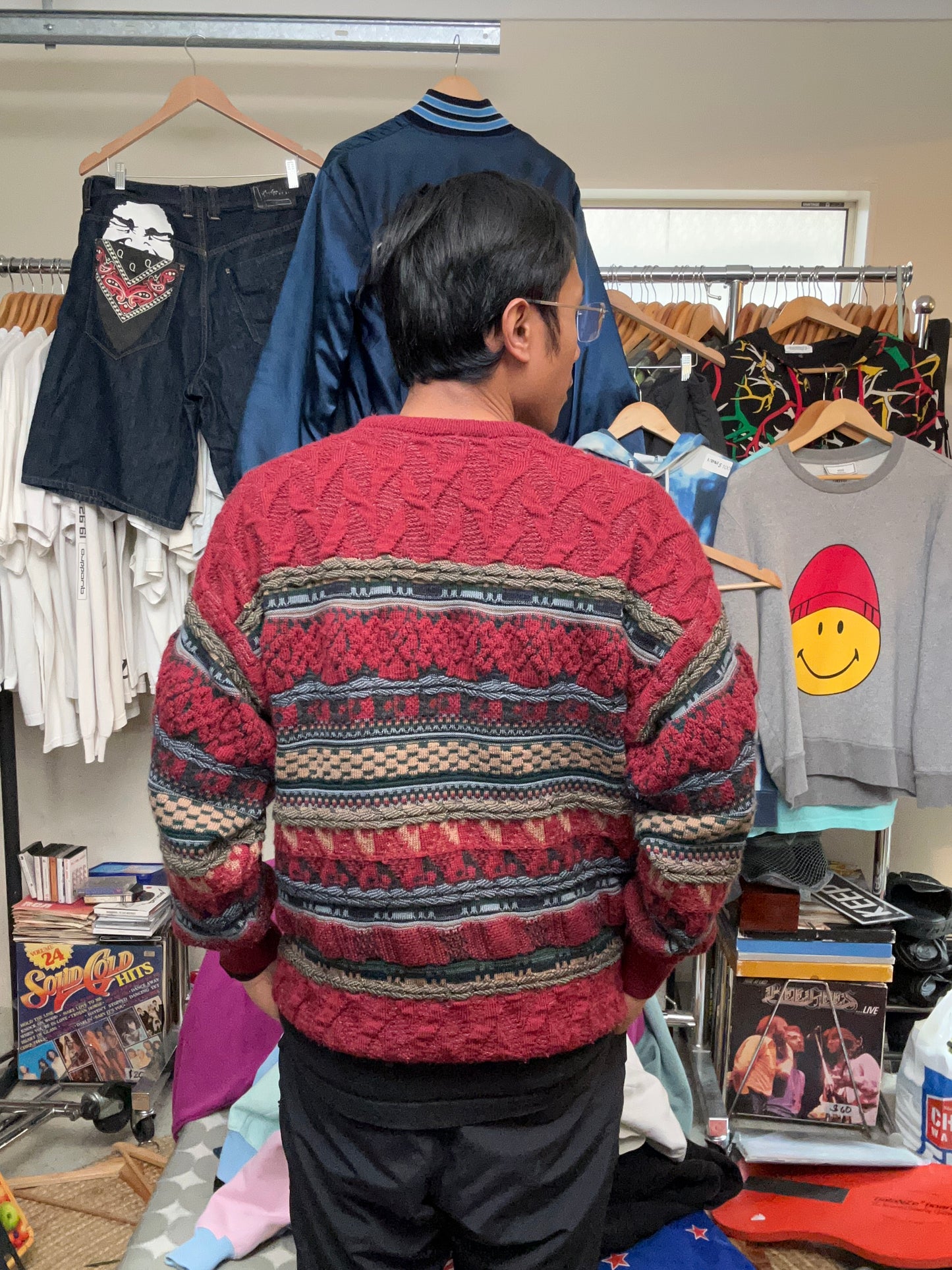 vintage Suave 3D knit sweater features a detailed geometric pattern in shades of red, black, and beige Medium