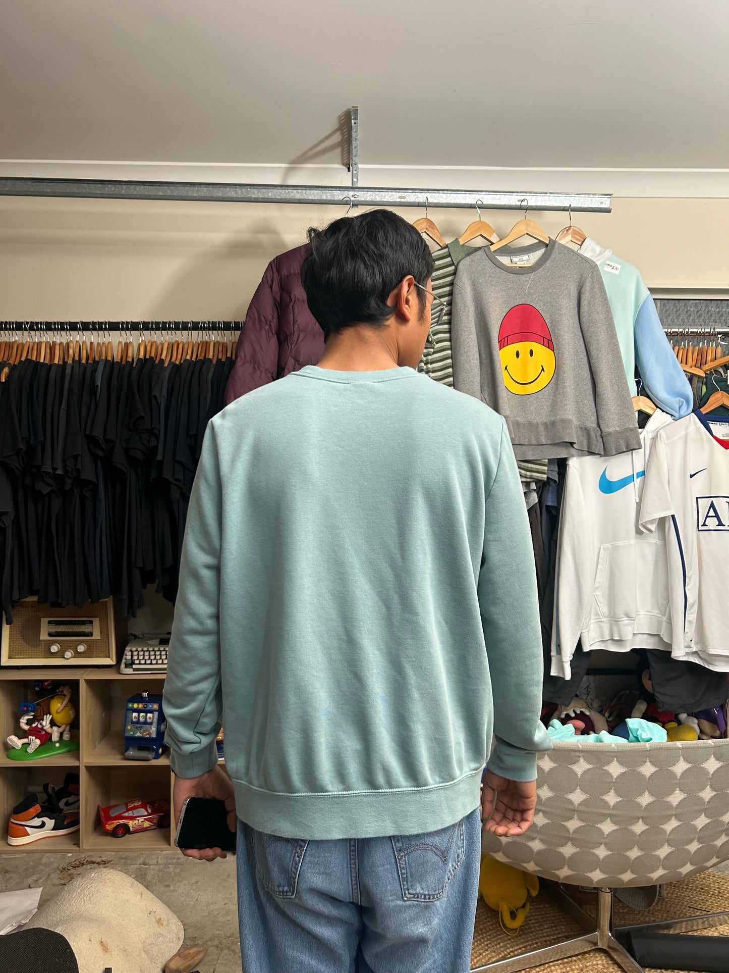 green Nike Men's Sportswear Club Fleece Crew features a classic embroidered logo on the chest Large