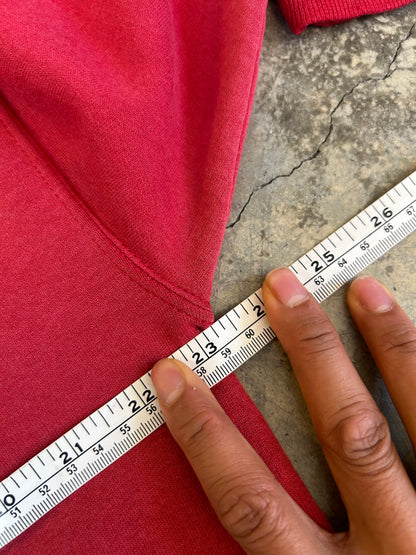 Vintage Fade red Champion hoodie features a prominent arched "HARVARD" spellout graphic and a comfortable kangaroo pocket Large