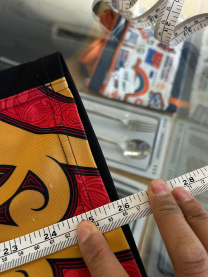 adidas 2014/15 Chiefs Super Rugby home jersey, featuring the prominent black, red, and gold Māori design panels along the sides and the classic bnz sponsor logo across the chest.