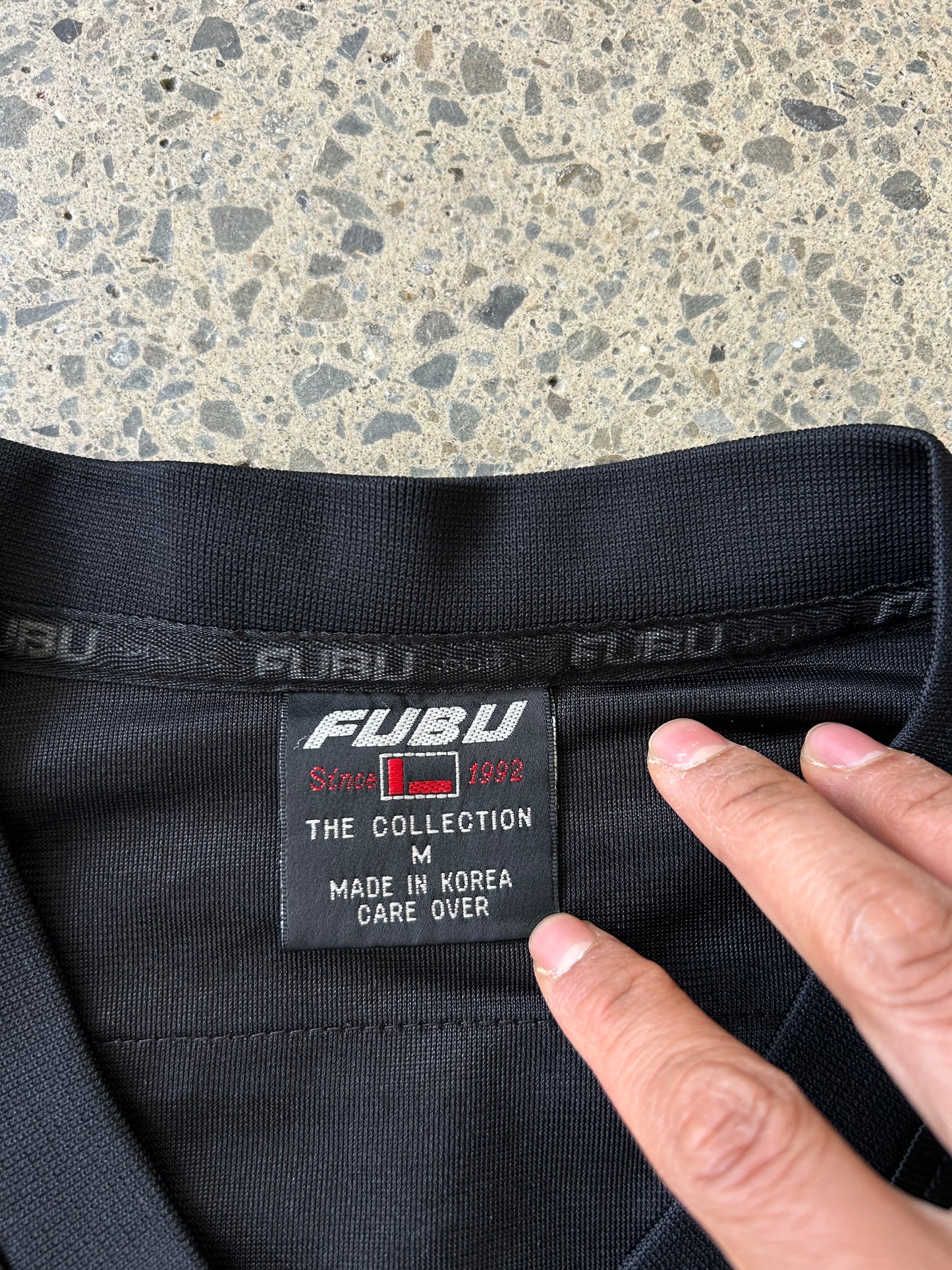 Vintage black FUBU Game Day jersey features gradient "05" numbering and embroidered branding Medium