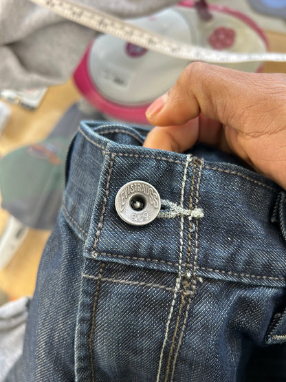Levi's 514 Slim Straight Jeans featuring unique back flap pockets and a twisted seam design size 32