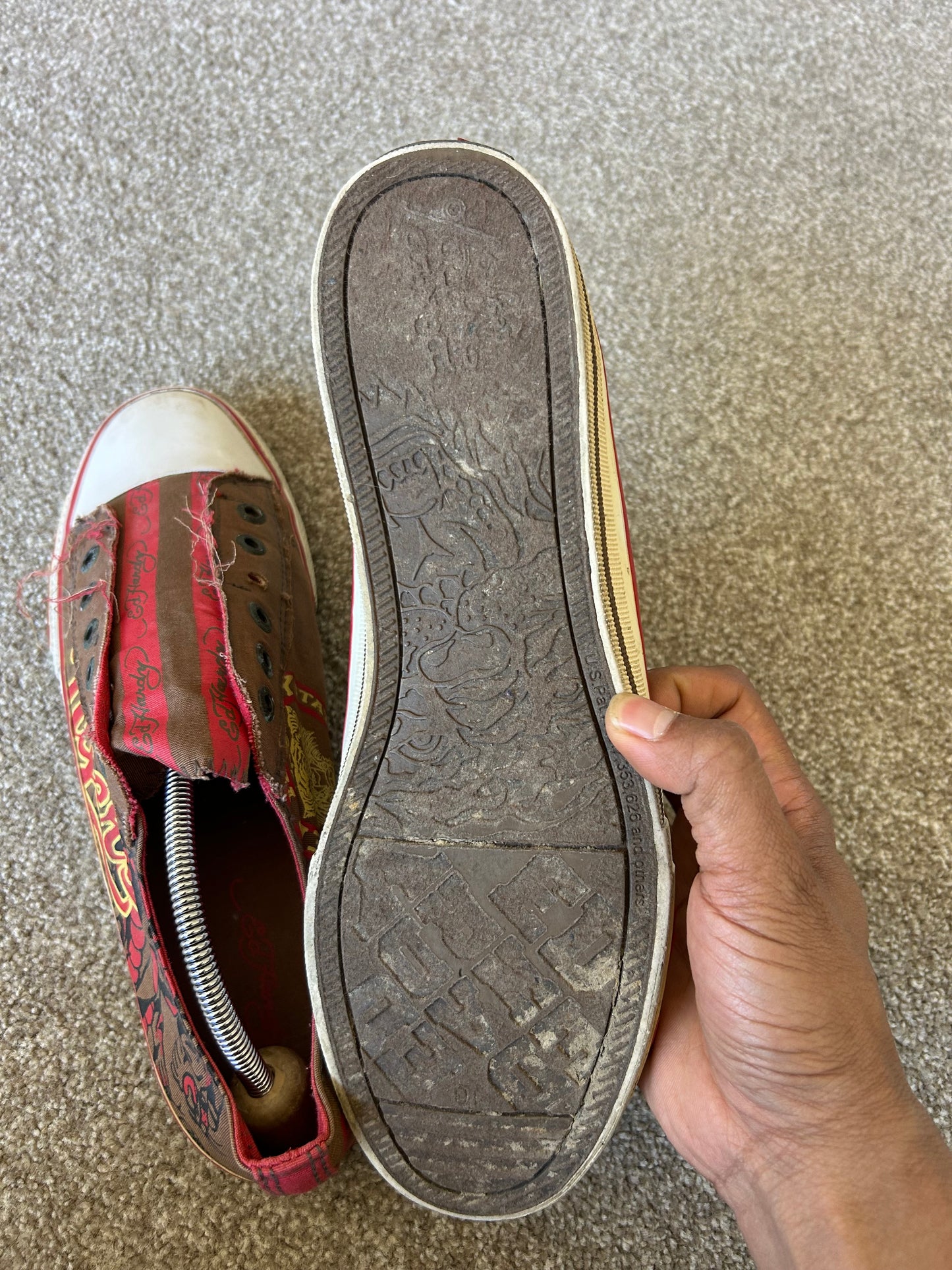 Ed Hardy slip-on canvas sneakers in brown and red with graphic prints.l Brown size US 10 EU 44