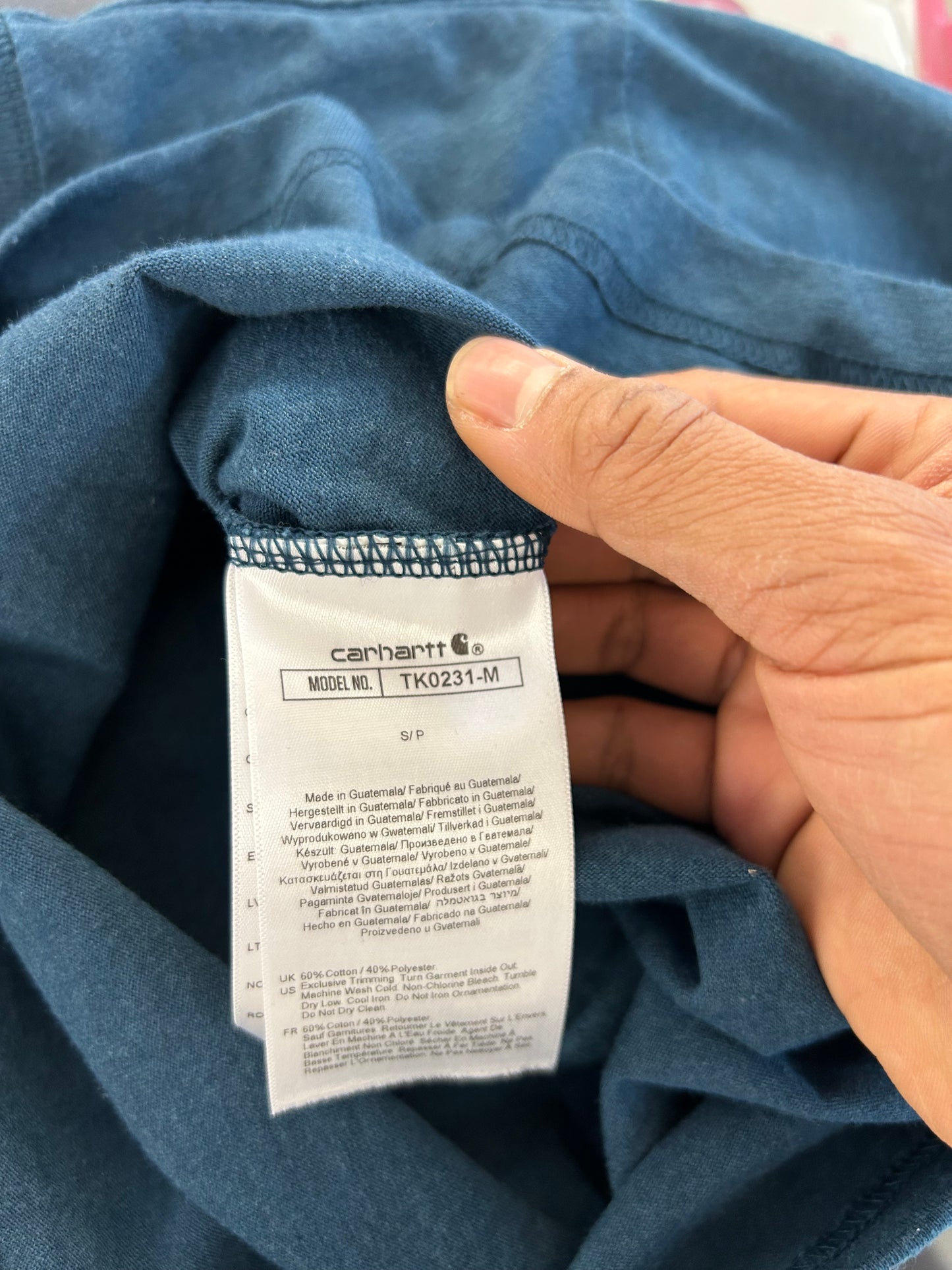 Carhartt Relaxed Fit Heavyweight Long-Sleeve Logo Sleeve Graphic T-Shirt in night blue heather with bold yellow lettering down the sleeve. Small