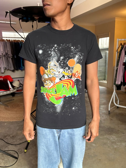 Small black graphic t-shirt featuring the characters and logo from the 1996 film Space Jam