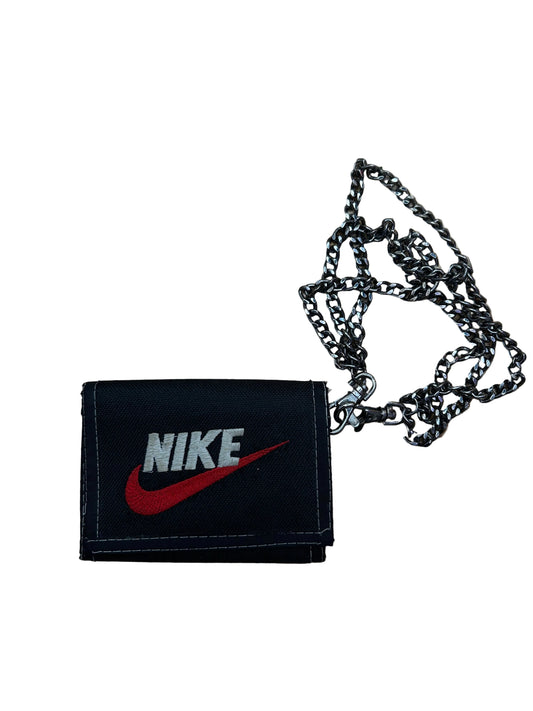 y2k vintage black canvas Nike trifold wallet featuring a red and white embroidered swoosh logo and a silver chain attachment.