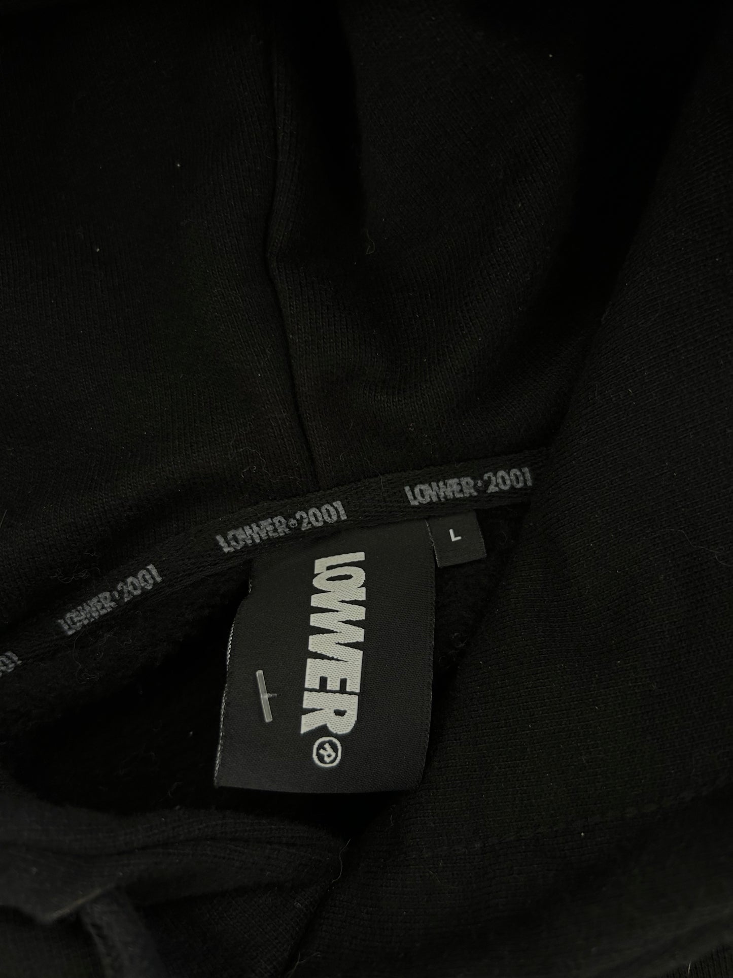 black Lower Billie hoodie featuring a tonal cursive logo on the chest.Large