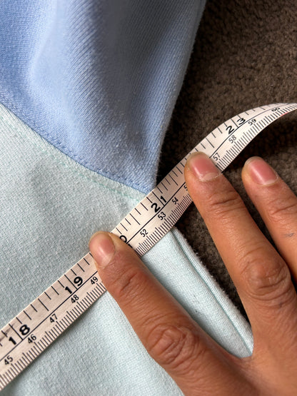 Tommy Jeans pastel color-block hoodie features a white hood, light green torso, and pink and blue sleeves Small