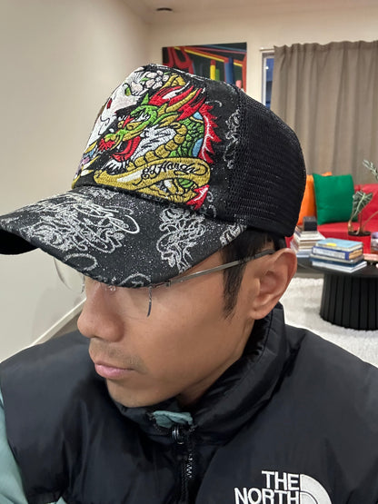 Vintage black Ed Hardy trucker cap features prominent embroidered dragon and geisha