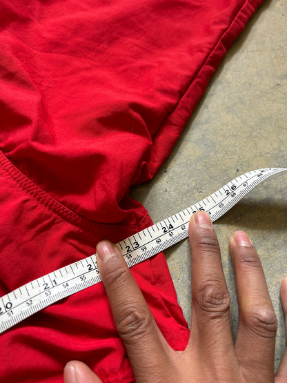vintage Patagonia jacket, likely from the Fall Line collection, featuring a vibrant red shell and a purple collar Medium