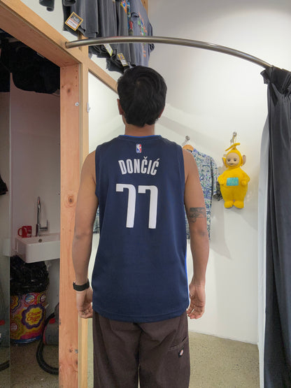 blue Nike NBA Luka Dončić Dallas Mavericks Statement Edition Swingman Jersey featuring the number 77 Small