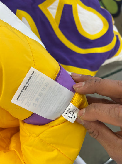 Nike x AMBUSH NBA Collection Los Angeles Lakers Hooded Jacket in summit white featuring bold purple and gold team lettering across the chest XXL