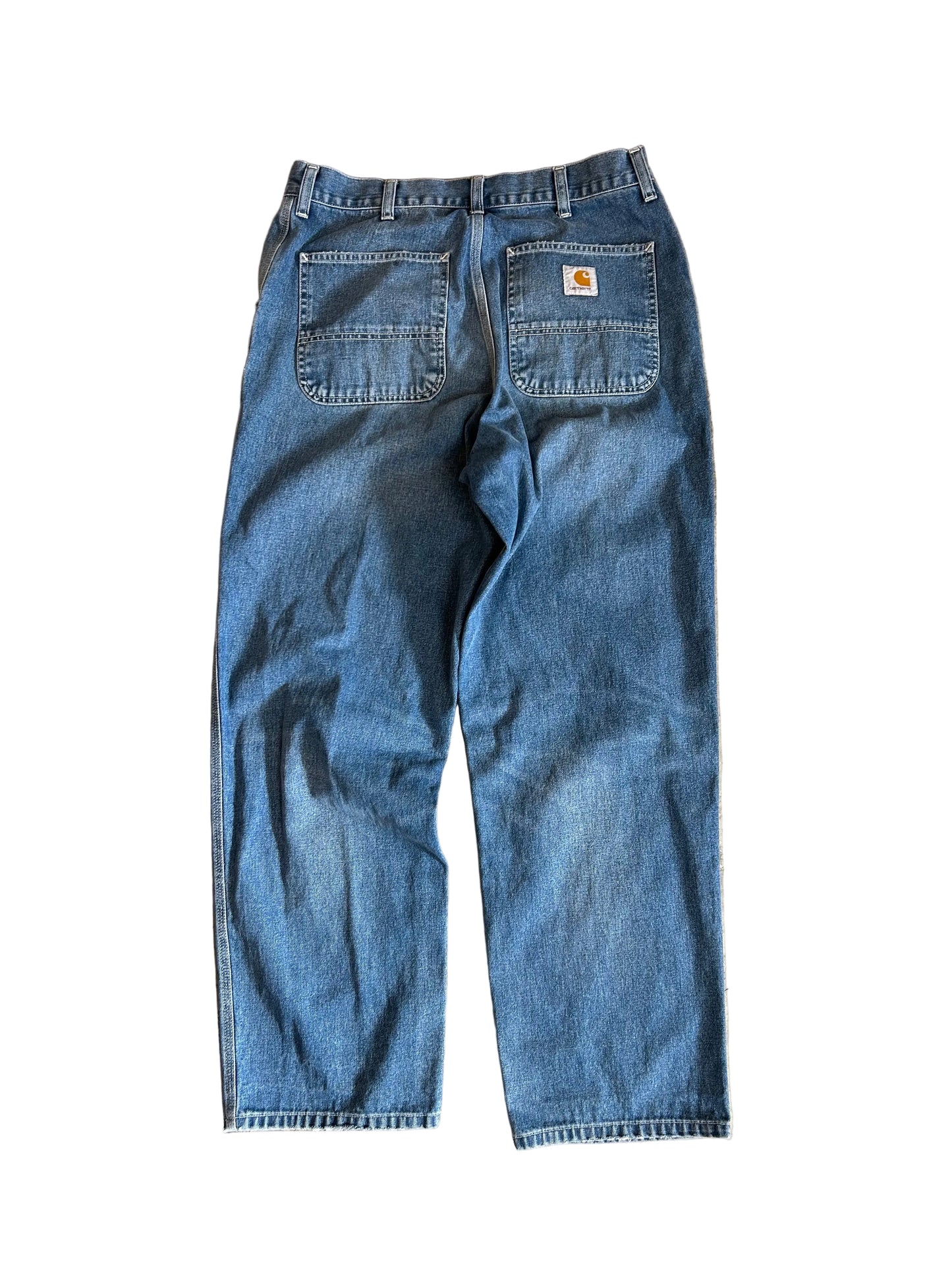 Carhartt WIP Simple Pants are rendered in a light blue stone-washed denim featuring the iconic square logo patch on the back pocket.Size 34