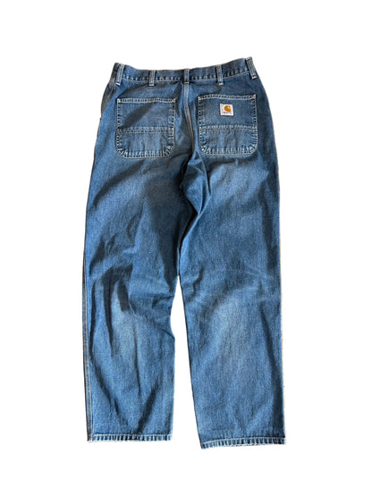 Carhartt WIP Simple Pants are rendered in a light blue stone-washed denim featuring the iconic square logo patch on the back pocket.Size 34